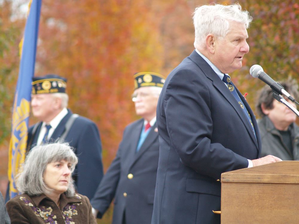 Speaker 4 at Podium